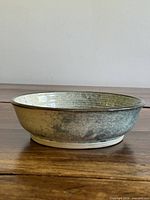 Side profile of bowl showing exterior glaze and foot ring
