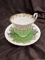 Teacup on saucer showing overall pattern and colors