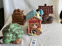 Group view of three cookie jars and cherry tree light