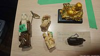 Group shot of all five figurines on tabletop
