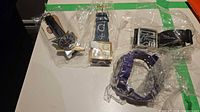 All four watches packaged