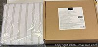 Sealed folded duvet cover and boxed set rear label visible