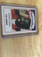 Front of Earl Monroe Foot Locker limited edition card in top-loader