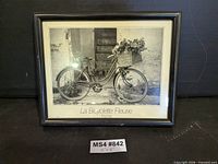 Front view of framed print showing image, mat, and frame
