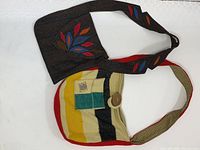 Both shoulder bags side by side showing front designs