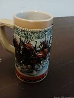 Front view of 1988 Budweiser holiday stein showing embossed Clydesdales scene