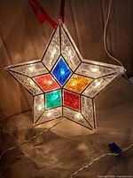 Star light illuminated showing multicolour panels and bulbs