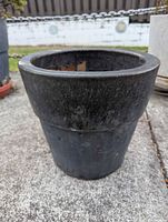 Side view of glazed gunmetal grey terracotta planter