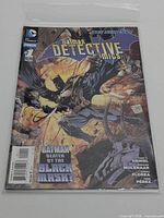 Front cover of Detective Comics Annual #1 bagged and boarded