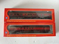 Both IHC boxed HO scale cars, front window view