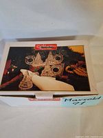 Retail box showing image of glass napkin rings