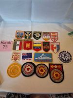 All 19 embroidered patches laid out