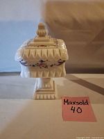 Full view of compote with lid on pedestal