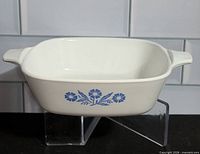 Front view showing blue Cornflower motif and handles