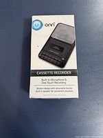 Front of boxed Onn cassette recorder