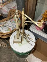 Both towel holders on bucket showing columns, arms, bases