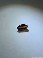Side profile of marquise tourmaline showing depth and color