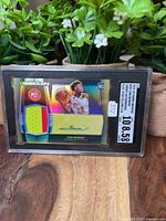 Front of SGC-slabbed Cam Reddish rookie patch autograph card