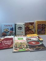 Group shot showing all ten cookbooks