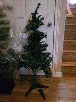 Full view of 4-ft pre-lit tree on stand