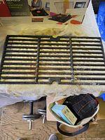 Single cast-iron grate on table