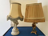 Both cherub lamps with shades