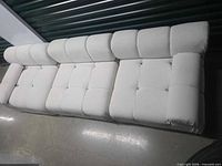 Top view of full three-section ivory bubble sofa