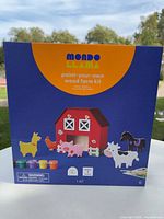Front of sealed Mondo Llama paint-your-own wood farm kit box
