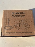 Front of unopened retail box showing product details and illustration