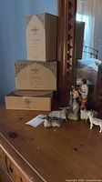 Full lot showing figurines and three Willow Tree boxes