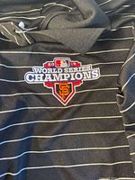 Front view showing embroidered World Series Champions logo and pinstripe pattern