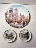 All three plates displayed on wall