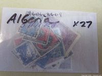 Algeria envelope showing assorted stamps and handwritten x27