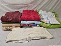 Overall stack showing variety of towel colors and sizes