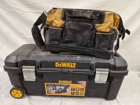 Rolling toolbox with soft tool bag on top