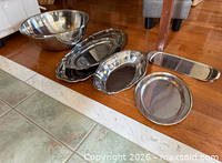 All items grouped: bowl, oval platters stack, round platter, rectangular tray
