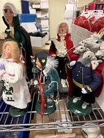 Group shot of all five Byers' Choice figurines on shelf