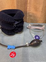 Inflatable collar and plastic brace side by side