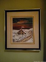 Full view of framed painting on wall