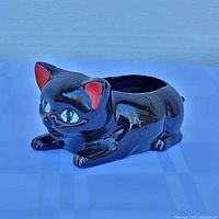 full view of black ceramic cat pin cushion holder