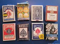 All eight playing card decks displayed