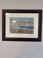 Full view of framed photograph on wall