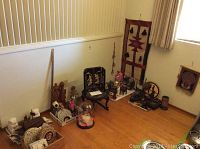 Overview of all assorted decorative items on floor against wall