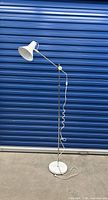 Entire floor lamp front view showing shade, pole and base