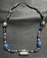 Full view of necklace showing pendant, beads, clasp