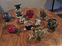 Group shot of all ten glass pieces on table