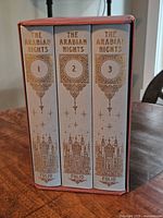 Spine view of all three volumes inside slipcase
