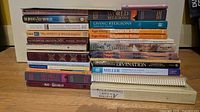 Full view two stacks of books showing variety and quantity