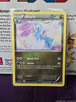 Front of Altaria 92/113 card in sleeve