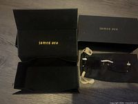 Sunglasses with box and pouch